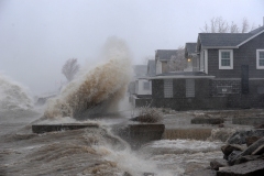 Hamburg , NY - December 23: Lake Erie waters wash over the shoreline on December 23, 2022 in Hamburg, New York United States. The Buffalo suburb and surrounding area  are expecting wind gusts over 70 miles per hour  battering homes and businesses through out the holiday weekend.  (Photo by John Normile/Getty Images)