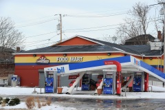 BUFFALO, NY - DECEMBER 28: A gas station canopy is collapsed along Niagara Street in downtown Buffalo on December 28, 2022 in Buffalo, New York. The historic winter storm Elliott dumped up to four feet of snow on the area leaving thousands without power and thirty confirmed dead in the city of Buffalo and the surrounding suburbs. (Photo by John Normile/Getty Images)